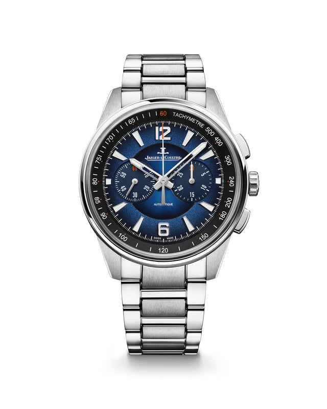 The Jaeger-LeCoultre Polaris Chronograph is a silver luxury wristwatch with a blue lacquered dial, three subdials, silver hour markers and hands, white text, a tachymeter scale, and a metal link bracelet.